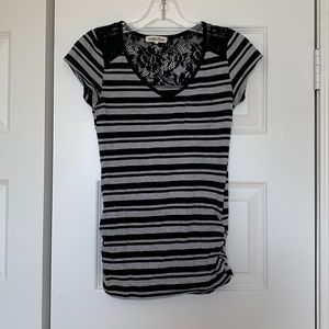 Used black and gray shirt. Size small.